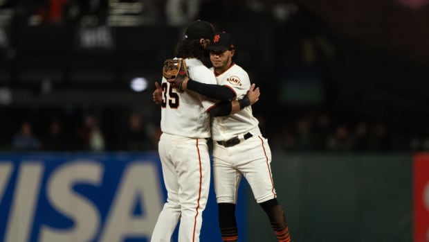 Sep 29, 2022; San Francisco, California, USA; San Francisco Giants shortstop Brandon Crawford (35) celebrates with second baseman Thairo Estrada (39) after defeating the Colorado Rockies at Oracle Park. Mandatory Credit: Stan Szeto-USA TODAY Sports